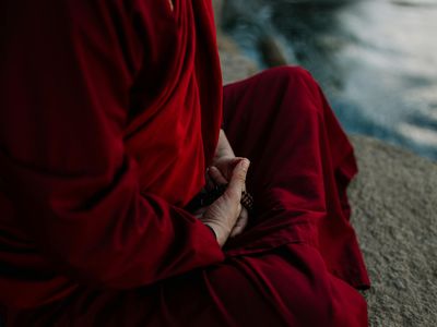 Focus on hands in a prayer position during meditation.